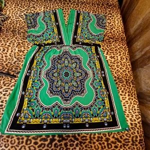 3X Women's top. Deep V-neck front and back.  Tunic length. Good condition.